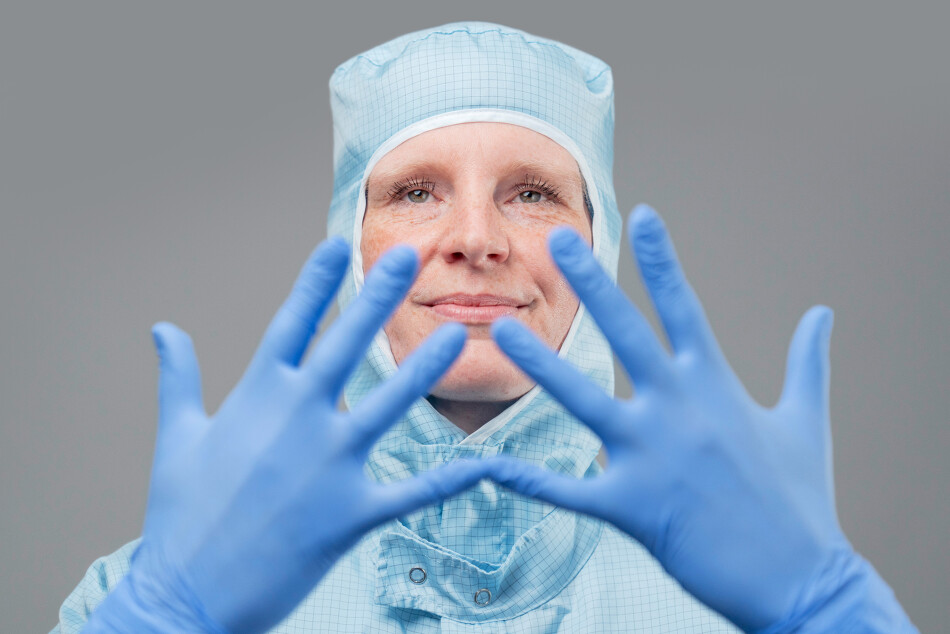 Employee in full safety clothing prepares for work.